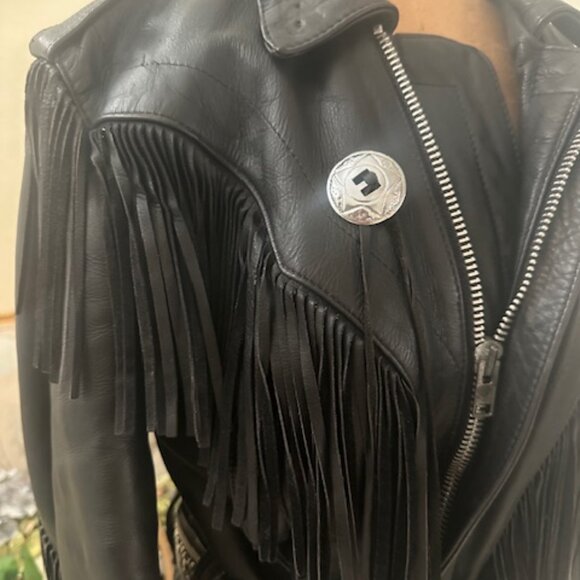 Vintage genuine, leather ladies, motorcycle jacket with fringe. Size medium.
